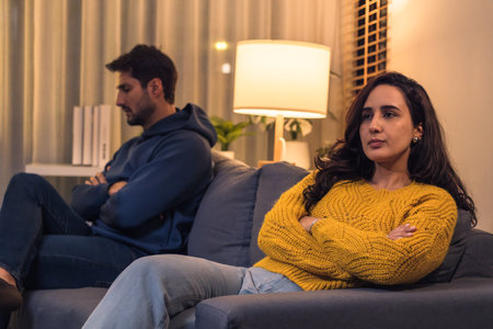 Angry hispaniccouple having relationship conflict and communication problem at homeの写真素材