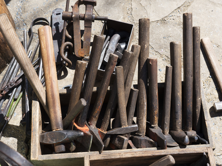 Forging tools, blacksmith equipment. Different types and sizes of hammersの写真素材