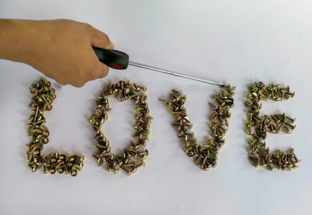 tapping screws made od steel metal screw iron screw screw screw as a background wood screwの写真素材