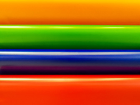 Glossy PVC plastic cards to select the color of furniture lined fan close-up on a white backgroundの写真素材