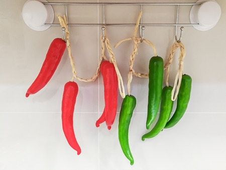 Artificial green chili peppersの写真素材