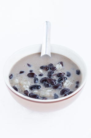 Thai dessert (Khow Nhew Tua Dam) Sticky Rice and black beans With coconut milkの写真素材