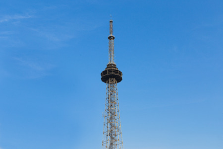Broadcast tower on blue skyの写真素材