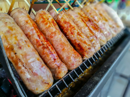 The East Sausages grill on hot wire rack Thailandの写真素材