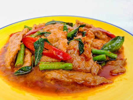 Stir fried crispy pork belly and red curryの写真素材