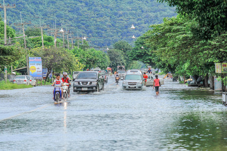 Lopburi, Thailand October 6, 2011: rain for several days, causing flooding streets and public houses.のeditorial素材
