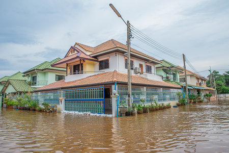 Lopburi, Thailand, in August, 26,2016: The heavy downpour caused a flash flood flooding into public houses.のeditorial素材