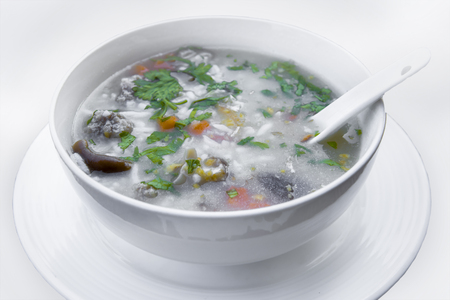 Top view of boiled rice pork or mush - Thai style breakfastの写真素材