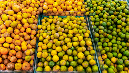 Pile of orange in the market for sales in the markeの写真素材
