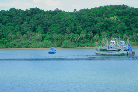 All the fishing boats tied up together in a fishing village