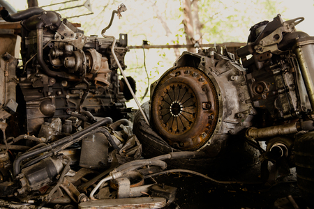 Close-up of the engine, throttle, raditor. Engine breakdown: pink antifreeze flows from the pipes of the motor of an old carの写真素材
