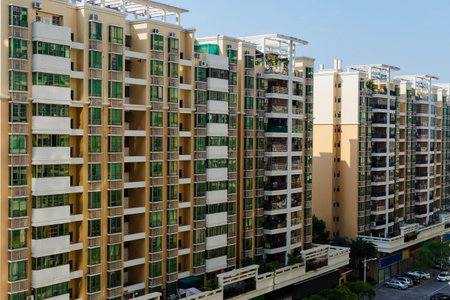 Suzhou, China - May,28,2018: Modern high-rise apartments located alongside a canal. Image captured...