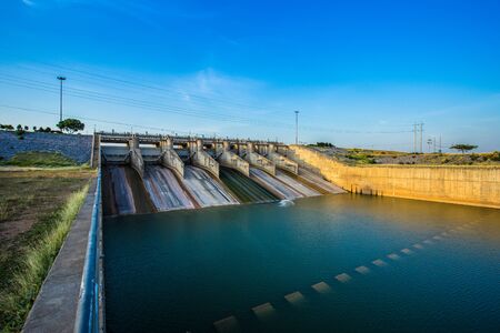 dried up empty reservoir or dam during a summer heatwave, low rainfall and drought in thailandの写真素材