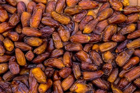 Heap of dried organic dates fruit for sale in Thailand local market