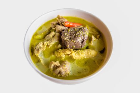 delicious thai food: green curry in a white bowlの写真素材