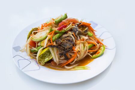Thai papaya salad hot and spicy mixed from variety of vegetable closeupの写真素材