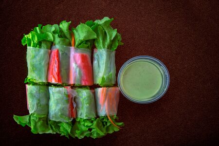 Fresh spring rolls with fresh vegetable and crab stick served with wasabi mixed salad cream dipping...