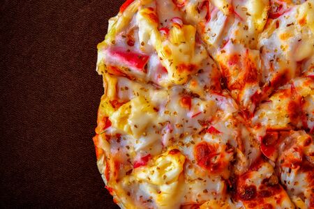 Pizza Restaurant Menu - Delicious Spicy Pizza with Sausages and Chili Pepper. Pizza on Rustic Wooden Table withの写真素材