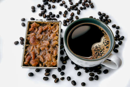 Hot coffee with cashews nut toffee cake