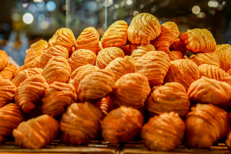 Curry puffs are a very popular snack item to have been adapted from Amphoe Muak Lek, Saraburi...