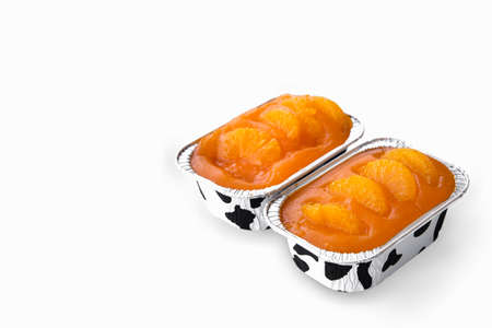 Closeup orange cake delicious on glass table background, selective focus