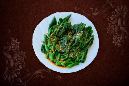 stir fried chinese kale(chinese broccoli) with oyster sauceの写真素材