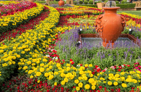 A public place with beautiful assorted-color flower arrangements during the festival.
