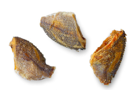 deep fried salty mango or Tilapia fish isolated on white backgroundの写真素材