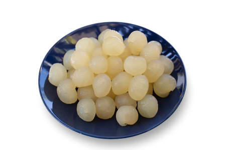 Fresh Longan, Dimocarpus longan meat was removed from longan bark in a white blow, Thai fruit. cooking concept.の写真素材