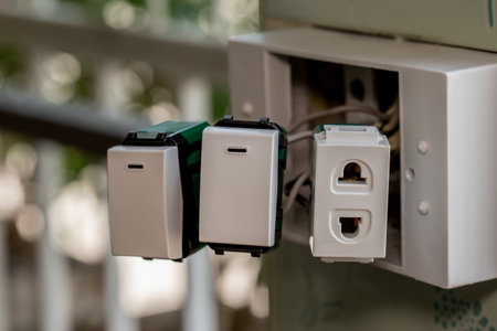 Electrical plugs and light switches in residences that are being repaired.の写真素材
