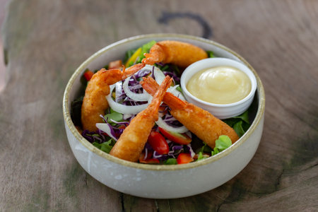 Restaurant seafood - Tempura shrimp and almond and cabbage saladの写真素材