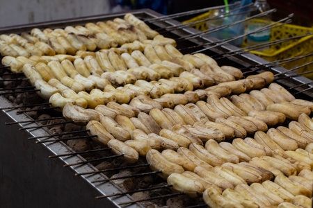 Grilled banana background. Grilled banana pattern. Bananas in Thailand. Grill the bananas on the stoveの写真素材