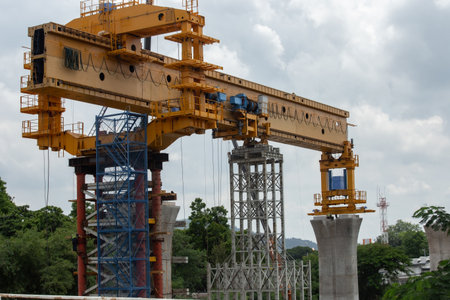 construction industry building infrastructure. motorway bridge architecture with crane and concrete...