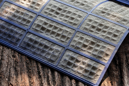 Close up dirty dust on air conditioner filter , Cleaning or changing the filter in the air...