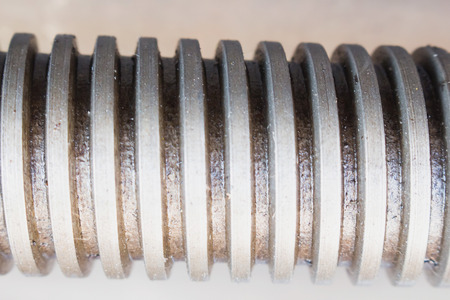 Set of lSet of long screws as industrial backgroundong screws