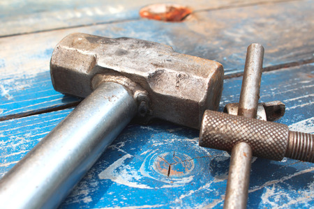 Old Hammers on Wood Backgroundの写真素材