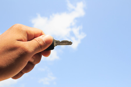 Hold key in skyの写真素材
