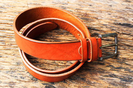 belt on woodの写真素材