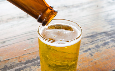 Beer pouring into mug