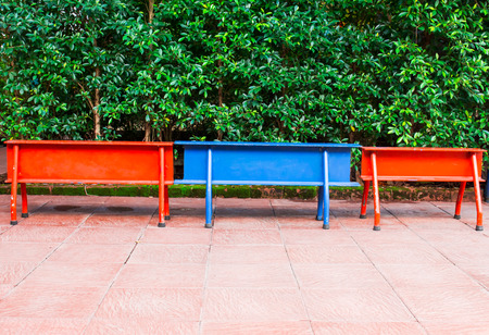 Colurful chair in leave green backgroundの写真素材