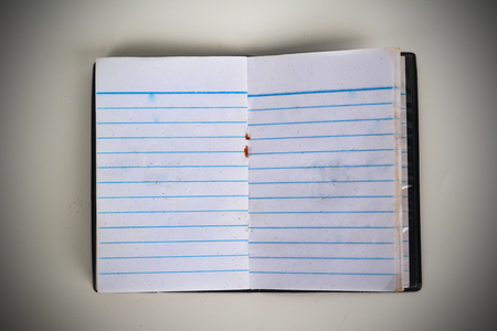 Old notebook on pure white background. This has clipping path.の写真素材