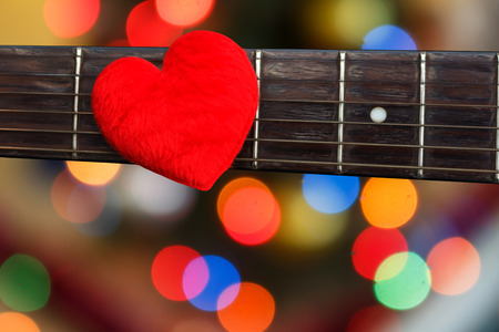 Valentines Day background with hearts on vintage guitarの写真素材