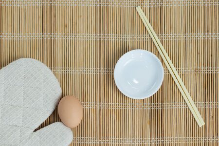 white plate on wooden tableの写真素材