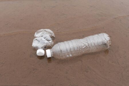 Plastic water bottles pollution in the ocean (Environment concept)