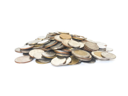 Pile of coins isolated on white background. Money and finance concept.