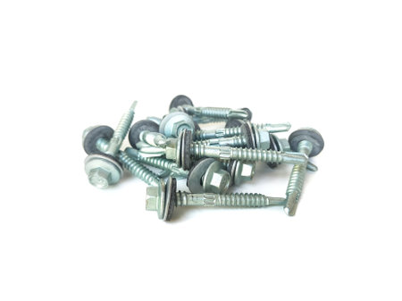 Nut for shooting Aluzinc with rubber support for the nut head for use with Aluzinc roof placed on a white background.の写真素材