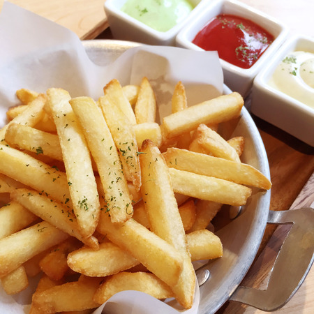 French fried potatoes with Sauceの写真素材