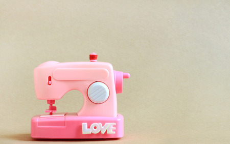 Model Pink Sewing machine with Love Logotypeの写真素材