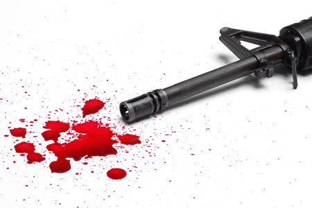 A rifle with blood dropsの写真素材