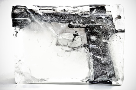 gun control   weapon control   frozen pistolの写真素材
